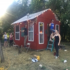 Ten Chances Artist Residents, painting the shanty!